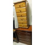 A pine chest of six drawers, a mahogany effect chest of two short and four long drawers,