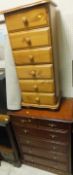 A pine chest of six drawers, a mahogany effect chest of two short and four long drawers,