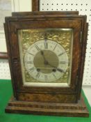 A German oak cased mantel clock,