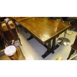 A 20th Century oak drawer leaf dining table