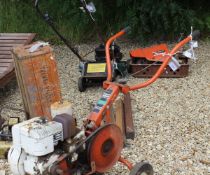 A Worsley Major Merry Tiller rotavator and various attachments,