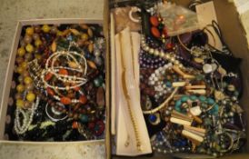 Two boxes of costume jewellery to include bracelets, necklaces, brooches,