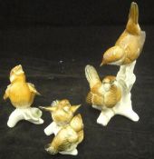 A Karl Ens porcelain figure group of two birds on a branch,