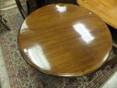 A Victorian mahogany circular breakfast table,