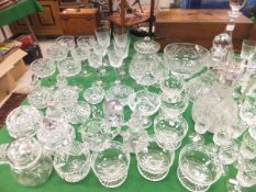 A collection of cut glassware to include ship's decanter, claret jug with plated mounts,