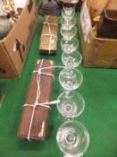 A set of three RMS Britannic wine glasses with engraved wavy decoration,