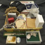 A cigar box containing various costume jewellery, Braun camera, coinage, compacts,