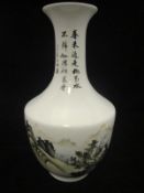 A large Chinese vase decorated with landscape scenes and buildings and bearing script to neck