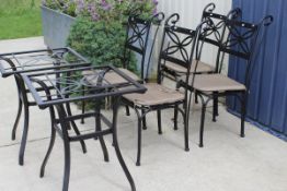 Four modern painted metal garden chairs with two matching tables