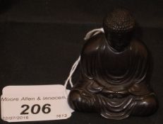 A Japanese miniature bronze of the sculpture of Buddha known as Kamakura No Daibutsu,