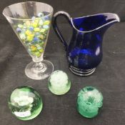 A Bristol Blue glass jug, a conical glass containing a collection of marbles,