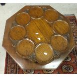 An oak carved Lazy Susan, a small oak wall hanging corner cabinet,