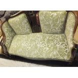 A late 19th / early 20th Century three piece salon suite comprising mahogany framed settee with