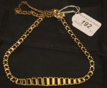 A 9 carat gold graduated chain link necklace and matching bracelet, 23.