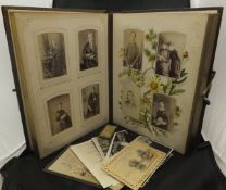 A circa 1900 gilded and embossed leather photograph album containing various family photographs