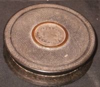 A 19th Century tortoiseshell box of cylindrical waisted form,