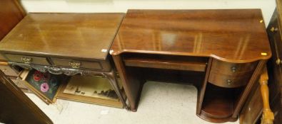 An early 20th Century mahogany dressing table of two short drawers on cabriole legs to brown china