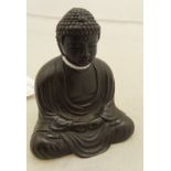A Japanese miniature bronze of the sculpture of Buddha known as Kamakura No Daibutsu,