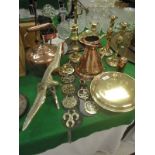 A selection of various brass and copper wares to include copper jug and kettle, brass warming pan,