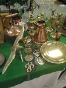 A selection of various brass and copper wares to include copper jug and kettle, brass warming pan,