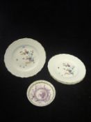 A set of four Meissen porcelain plates painted in the Kaikemon taste and with relief decorated