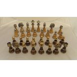 A modern turned wood and metal mounted chess set,