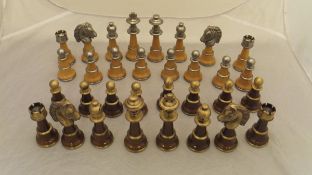 A modern turned wood and metal mounted chess set,