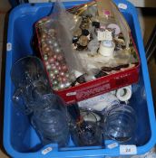 A box of assorted glass and china plus a tin of varrious buttons and beads