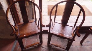 A pair of OKA elm Chinese style elbow chairs CONDITION REPORTS General wear and tear