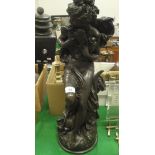 A large bronze effect resin figure of a Classical maiden