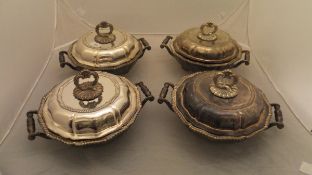 A set of four silver plated twin-handled chafeing dishes,