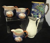 A collection of decorative china wares to include a 19th Century Wedgwood majolica jug relief