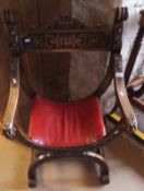 An early 20th Century oak X-framed "Lords" chair,