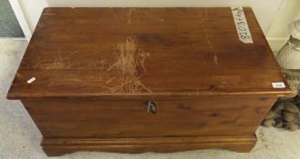 A stained pine coffer / blanket chest, a black painted wooden chest with iron fitments,