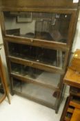 An early 20th Century oak Globe Wernicke style four section bookcase