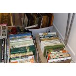 Eight boxes of pictures and books to include autobiographies,