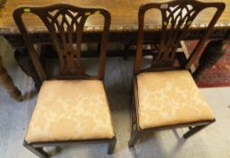 A set of four 19th Century mahogany dining chairs in the Chippendale manner