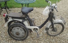 A Honda P50 moped with pedal start registration number MCG 85F and bears a tax disc for June 1975.