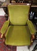 A 19th Century mahogany framed library chair with green velour upholstery,