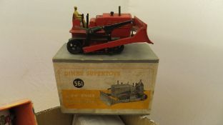 A collection of various model vehicles including Dinky Supertoys 561 Blaw Knox Bulldozer,