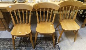A set of eight beech kitchen chairs (6 plus 2 carvers)