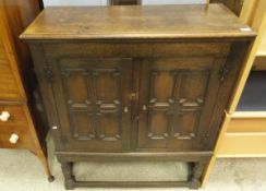 An oak food cupboard,