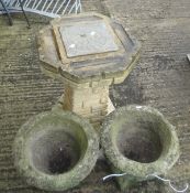 A composite stone sun dial together with a pair of composite stone garden pedestal urns