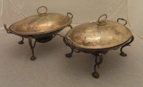 Two 19th Century silver plated and twin-handled food warmers with spirit burners,