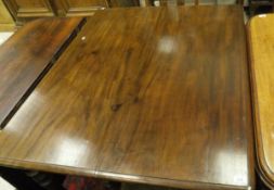 A 19th Century mahogany gate leg drop leaf dining table,