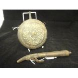 An 18th Century Indo-Persian horn shot flask of slim proportions, with brass banding,