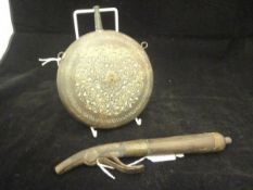 An 18th Century Indo-Persian horn shot flask of slim proportions, with brass banding,