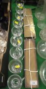 A set of three RMS Britannic wine glasses with engraved wavy decoration,