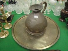 An early 20th Century two gallon copper haystack measure and a Benares type brass tray