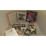 A box containing a large collection of autographed photographs and memorabilia to include Victoria